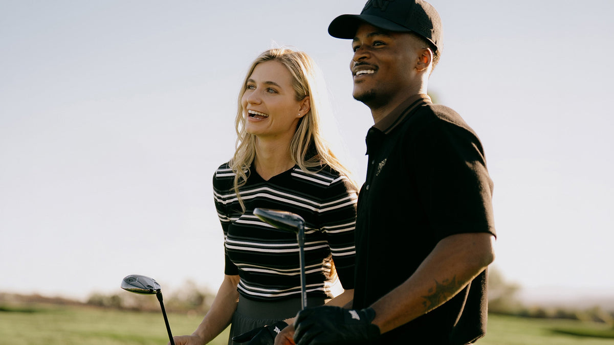 Golfers in PXG apparel on course