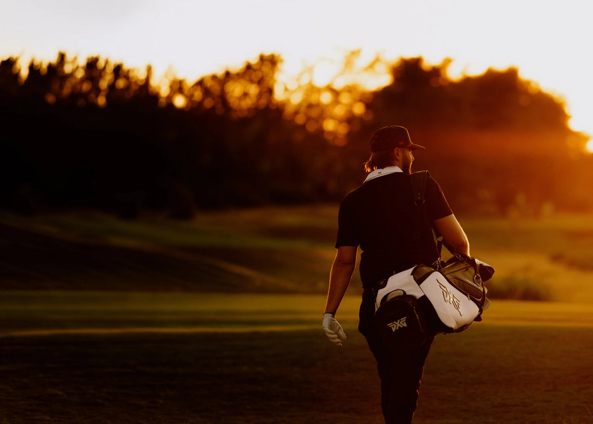 Golfer with PXG clubs